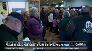 1.14.17 - screenshot of 9News report and chyron on coffman leaving frustrated crowd